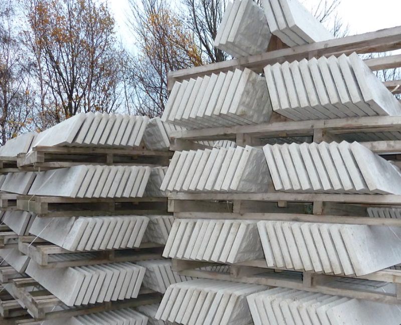 A pile of precast concrete blocks stacked on top of each other
